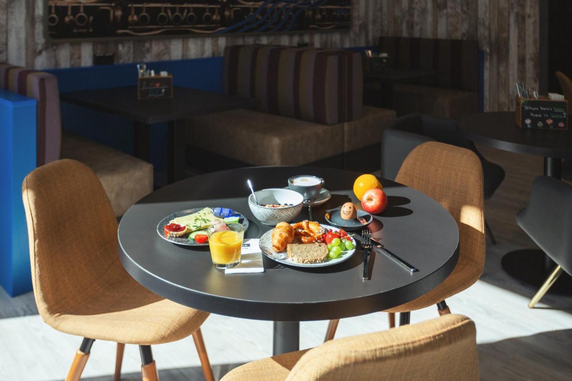 Holiday Inn - The Niu, Brass Munich Olympiapark By Ihg Exterior photo